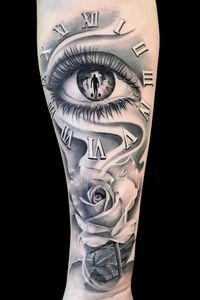 Black and grey eye with rose & roman numeral clock