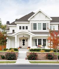 Because white exteriors are beautiful and timeless ... | photographed by Meagan Larsen Photography |