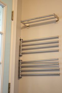 IKEA towel bars??? GREAT idea! Hope, Longing, Life: Ikea towel bars for drying clothes in the laundry room.Great idea for hanging a collection of scarves for headwrapping.  Kx