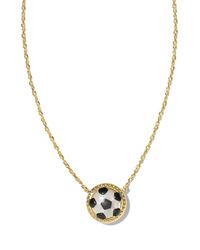 Score major style points when you wear the Soccer Gold Short Pendant Necklace in Ivory Mother-of-Pearl. A shimmering soccer ball pendant complete with gunmetal detailing, this sporty style brings the spirit to every game. Metal 14k Yellow Gold Over Brass Closure Lobster Clasp W/ Single Adjustable Slider Bead Size 19"Chain, 0.51"L X 0.49"W PendantDue to the one-of-a-kind nature of the medium, exact colors and patterns may vary slightly from the image shown. | Kendra Scott Soccer Gold Short Pendan