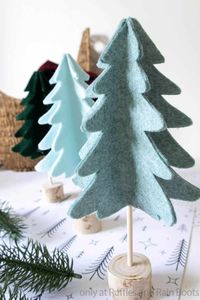 I love how easy it is to bring holiday charm to your mantle with these DIY Scandinavian Christmas trees! They're so cute but having a Cricut cut file for Christmas trees is perfect! Grab the quick Christmas craft tutorial here.