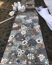 Outdoor garden. Path. Flower garden path. Mosaic