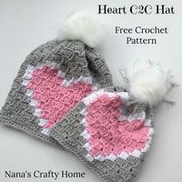 The Heart C2C Hat is a free crochet pattern for a heart hat worked in corner to corner crochet technique.  A fun and easy pattern perfect small project for someone wanting to learn corner to corner (C2C) technique!  Graph and written row by row instructions are included! free crochet hat pattern, hat crochet pattern, c2c hat heart pattern, heart crochet hat pattern, hat heart crochet pattern #nanascraftyhome #c2c #crochet #crochetpattern #freecrochetpattern #valentinesday