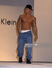 News Photo : Singer Mark Wahlberg walks the runway at the...