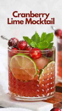 The Cranberry Lime Mocktail harmonizes invigorating mint simple syrup, zesty fresh lime juice, tart cranberry juice, and sparkling water. Each ingredient creates a symphony of flavors, from the refreshing citrus burst to the revitalizing mint undertones. Sip the Cranberry Lime Mocktail during outdoor gatherings or intimate soirées, as its invigorating profile complements moments of camaraderie. #CranberryLimeMocktail