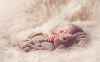 Prepare to possibly shed a tear with these stunning newborn photo ideas for all mums and mums-to-be.