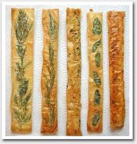 layer your herbs in between a couple of sheets of filo pastry brushed with plenty of butter, season and bake in a hot oven for 3-4 minutes....Yum!