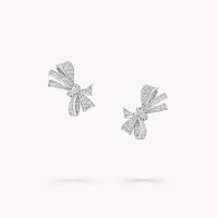 Capturing the delicacy of a bow, freshly tied by hand, every precious curve of our white gold Tilda’s Bow diamond stud earrings is set with round and baguette cut diamonds. Each of the baguette cut diamonds has been individually shaped by our master cutters to fit the design, requiring great patience and skill. An enduring influence on the House of Graff, the Tilda’s Bow collection is latest, lifelike interpretation of the much-loved bow motif, which has inspired a whole collection of jewels, in