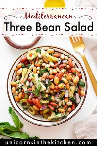 This Mediterranean three bean salad is made with your favorite beans, olives, artichokes and other Mediterranean vegetables and herbs. It's the perfect vegan side dish for summer and it takes only 5 minutes to put this healthy salad together. The best part is the fresh and delicious dressing!