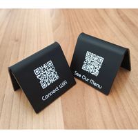 Our Mini Acrylic QR Table Stands are Durable and easy to clean! We PRINT for you your logo, QR, Table Number, or anything you need Use both their sides to Print on them your QR Code for your Menu or/and your QR Code for your WiFi Connection, or your Logo, your social media, or VENMO payment, or other payment methods, in any colour you like! You have other ideas that may work better for you? Let us know! We can print anything on them for you! You may use them at your Buffet, your Food Showcase or