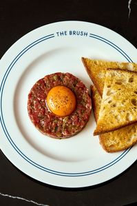 The flavours of Sri Lanka never cease to impress Londoners, but there's always space for a new Italian or a nod to the grand cafes of Europe...  Read this issue's 'table talk' for the latest roll call of must-try restaurants.  Steak tartare, The Brush Grand Cafe  📸 Charlie McKay 🖊️ Alex Mead  #foodandtravel #tabletalk #restaurants