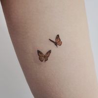 I would probably never get a butterfly tattoo, but I think these are so pretty. #beautytatoos