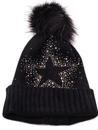 This season's trendy hat is here! This black pom hat keeps you warm, while looking chic. One size fits most