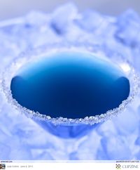 Blue Christmas (1 cup Vodka or Rum 1 cup white cranberry juice 2 ounces blue curacao (1/4 cup) 1 - 2 tablespoons fresh lime juice- in a shaker-Ice cubes, strain)