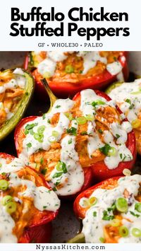 These buffalo chicken stuffed peppers are an easy, delicious dinner that everyone will love! Made with shredded chicken, spicy buffalo sauce, and topped with a generous drizzle of ranch dressing and fresh herbs. Healthy, flavorful, and easy to make! Whole30, paleo, gluten free, dairy free, and low carb / keto friendly.