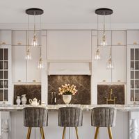 This Modern 3-Light cluster chandelier is a stunning combination of finishes and unique texture glass shades that will transform any room into a stylish and inviting space.