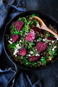 Warm Lentils with wilted chard, roasted beets, goat cheese and spring herbs. A simple tasty vegetarian meal! #lentils #chard #beets #vegan #eatclean #cleaneating #halfcuphabit #justaddpulses | www.feastingathome.com