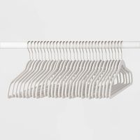 Help make the most of your available closet space with this 30-Pack of Suit Flocked Hangers from Brightroom?. These versatile flocked hangers can keep tops, pants, dresses and more neatly organized in your closet while creating a tidy, coordinated look. They come in a thin design to help you maximize your closet space, and feature a non-slip flocked velvet coating to help keep garments from sliding off. Just add storage bins below your hanging items for shoes and handbags to have a complete and