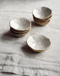 A sweet stack of Speckled Oat pinch bowls ~ the perfect size for seasonings or condiments.