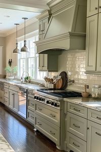 Explore 33 modern sage green kitchen design ideas. From cabinetry to decor, find inspiration to create a serene and trendy kitchen space. Click to see more and save the pin!