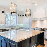 Black Kitchen Island with Taj Mahal Quartzite Countertop