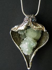 062514 milkweed ~ I used a milkweed pod to make this necklace with fine silver and place a  beautiful prehnite crystal in the center.