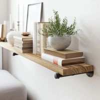 The 72-inch Industrial Pipe Bookshelf combines rustic wooden shelves with sleek industrial pipes for a bold and stylish storage solution.