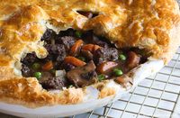 Enjoy some cold-weather comfort food with this meaty, hearty recipe for savory steak and mushroom pot pie.