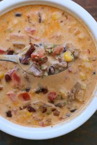 Instant Pot Cheesy Cowboy Soup--a hearty soup with beef, potatoes and cheese. A perfect supper for your hungry cowboys and cowgirls!