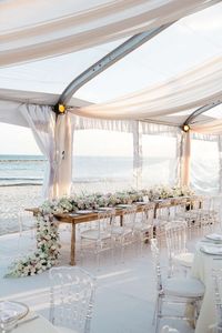 beach wedding ideas sheer tent with ocean backdrop