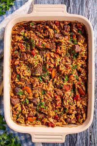 Giouvetsi (or Youvetsi) is a slow-cooked Greek dish made with stewed beef (or lamb) and orzo pasta in a rich and deeply flavored sauce. It's perfect for a cozy Sunday family dinner, or any time you're craving a comforting and delicious meal!