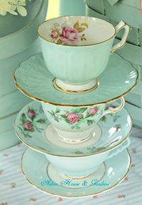 Aiken House & Gardens: Touches of Aqua ( A stack of aqua teacups.)