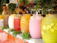 Aguas frescas served in a styrofoam cup will always be a throwback to Sunday outings after misa. | 32 Sweet Mexican Treats That You Might Have Forgotten About