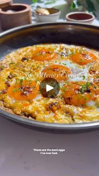 604K views · 3.2K reactions | Spicy Heavy Cream Eggs 🥹 something freaking magical happens when you fry eggs in heavy cream…comment ‘EGG RECIPE’ and I’ll DM you full printable recipe!  I now have a website so I’ll be resharing some favorites!
The cream caramelizes and the results are sublime, especially with a bit of salsa macha or chili crisp! I learned this while working in restaurants and it was a game changer!

Ingredients:
•4-5 eggs.
•1/4 cup heavy cream.
•1 tbsp salsa macha + more for topping.
•chives to taste.
•salsa macha.

Directions:
1. Preheat a pan for 2 min on high. Add in heavy cream and chili crisp. Lower heat to medium and simmer for 1 min.
2. Add in eggs and cover. Cook like this for 2-3 min until the whites set.
3. Top with chives, seasoned eggs and chili crisp.

#eggs #e