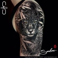 Leopard black and grey tattoo by Sanlee tattooer of Inkeds