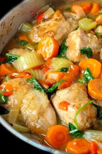 Smothered chicken is one of my favorite comfort foods. Tender moist chicken smothered in onions, carrots, celery, peppers and spinach and a yummy sauce - all in one skillet. Food for the soul, this one pot meal of chicken and vegetables goes way back, over 30 years at least.