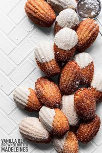 The perfect dessert for holiday baking or a cookie exchange, this Vanilla Bean Browned Butter Madeleine Recipe features rich flavors in a tiny, soft sponge cake. Whip up a batch and enjoy! #cookies #cake #dessert From Minneapolis Food Blogger Karly Gomez | asimplepantry.com