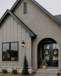 Jill Rolling | This moody exterior at Christmas time >>> So beautiful dressed up with wreaths and trees! Comment “exterior” for a link to this home’s... | Instagram