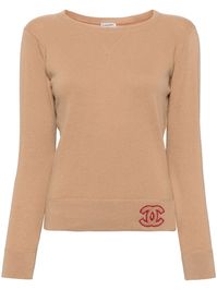 circa 2001 light brown cashmere signature interlocking CC logo round neck long sleeves straight hem Condition: GOOD. This previously owned and used item is in good condition with minimal signs of use. This may include fading of material or plating and scratches. Purchasing this item continues its narrative and reduces the environmental impact by avoiding the use of new resources needed to make the product from scratch, such as water, materials and electricity, and avoiding additional manufacturing impact. Learn more about what makes a product Conscious on our Conscious Criteria page