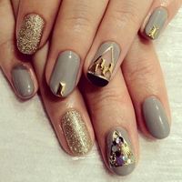 grey nails with gold glitter & jewel embellishments