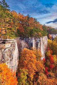 Make the most of peak leaf season in West Virginia by booking an idyllic cabin escape, camping trip, or romantic weekend with a side of soft adventure. #fallleaves #fallfoliage #westvirginia #falltrips #fallcamping #southernliving