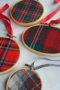 Plaid ornaments from Upscale Downhome could be cute place cards if embroidered.