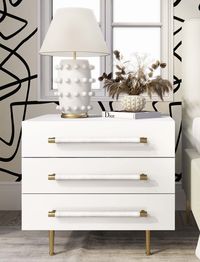 Simple yet brimming with understated elegance, the Trident nightstand offers modern appeal and stylish functionality. Featuring plenty of storage space for your essentials, soft-close drawers, and brass accents. TOV Furniture