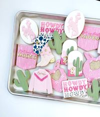 This ain't her first rodeo - it's her second! 💕✨🐮 . . . . #cowgirl#cookies#decoratedcookies#sugarcookies #royalicingcookies#secondbirthday#pink#rodeo#birthday#birthdaycookies