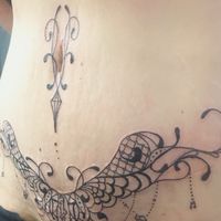 50 Gorgeous Tattoo Ideas to Cover a C-Section Scar | CafeMom