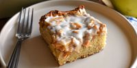 This apple fritter cake was inspired by the delicious flavor of a warm, cinnamon apple fritter. The lightly spiced cake batter is baked with plenty of chopped tart apple on top, and then finished with vanilla icing. Serve warm for best flavor and texture.