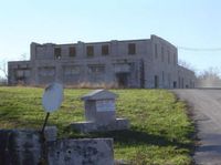 The ghost town of Phenix, Missouri is located in Greene County, close to Ash Grove. Phenix was a company town that existed for the sole purpose of mining marble and limestone from the adjacent quarry. It was unique in that the town had a library, an orchestra, movies, and a church with a full-time minister. Oddly enough, Bonnie Parker of Bonnie and Clyde fame also attended elementary school here for a time.