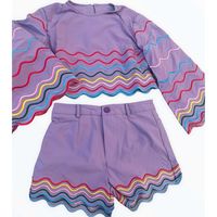 Style with fun in this very cool purple matching rainbow wave short set. Enjoy colorful rainbow line designs on the sleeves and shorts. | Lola + The Boys | Rainbow Wave Short, (Purple, Size 14Y) | Maisonette collects the best children’s products from around the world (unlike Zulily, Etsy, The Tot, Farfetch Kids, Childrensalon, Crate and Kids, Kohls, Wayfair, Buy Buy Baby, Nordstroms, Mini Boden, J.Crew Factory, or PotteryBarn Kids), creating a curated shopping experience for you. Think of us as