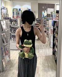 fluffy hair cute boy attractive aesthetic inspo frog plushie pj pants outfit fit check teen boy guys men fashion grunge jewlery black hair room