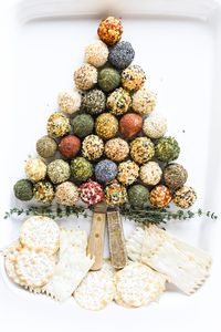 My mini cheese ball holiday platter is festive and such fun to make. Individual bite sized cheese balls are tossed in flavorful toppings ready to schmear onto your favorite cracker. Cute, easy, and delish. What more could you ask of an appetizer?